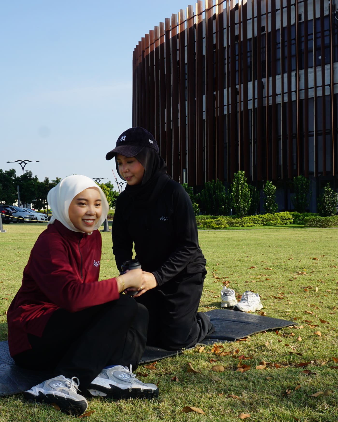 Warm-down chat on the grass after a workout